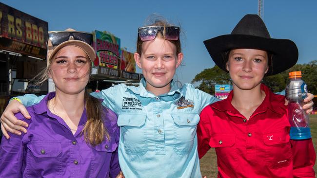 Olivia Cunningham, Tia Cortes and Lani Webb at the 2024 Top End Rock N Rodeo Muster at the Darwin Showgrounds. Picture: Pema Tamang Pakhrin.