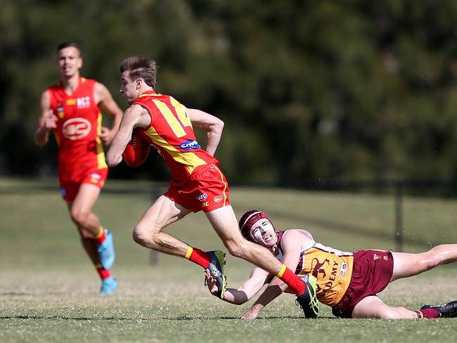 August 16, Gold Coast, Queensland - Gold Coast Suns Academy player Max Pescud (#14) in action against the Brisbane Lions at Labrador during the VFL NAB League. Scott Powick Newscorp