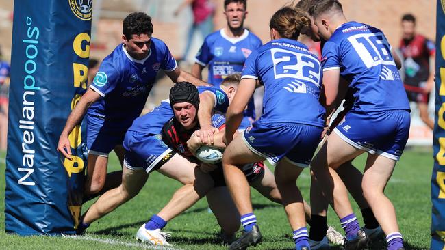 Jay Delaney crashes over for a try for Kiama. Picture: Steve Montgomery Sports Photography