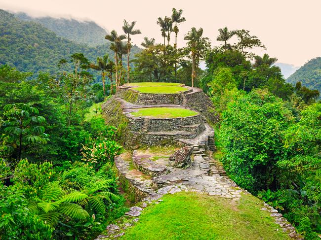 Photo of ancient terraced structures, stonework, architecture at Ciudad Perdida (Lost City) in the Colombian Highlands, Colombia's Sierra Nevada Mountains, South America.