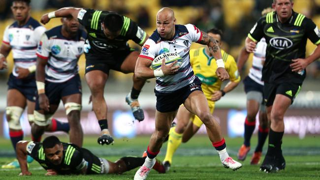 Billy Meakes of the Rebels makes a break during the round 12 Super Rugby match.