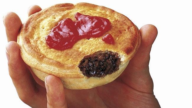 Four' N Twenty Lite meat pie with tomato sauce in the shape of Australia. Food