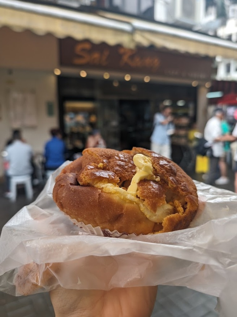 It’s called a pineapple bun – but it’s got no pineapple in it at all. It’s a milk bun filled with butter – and it’s amazing.