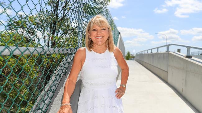 Deputy Mayor Donna Gates officially opens the new bridge at Pimpama allowing direct access to Gainsborough Greens. Pic Tim Marsden.