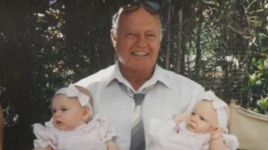 Robert Driver, pictured with his twin granddaughters, died after he was allegedly king-hit by another resident at his nursing home.