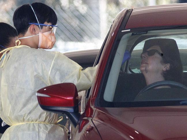 MELBOURNE, AUSTRALIA - NewsWire Photos MARCH 31, 2021: DHHS staff conduct covid testing at the Drive through testing site in Heidelberg on Wednesday afternoon. Picture: NCA NewsWire / David Geraghty