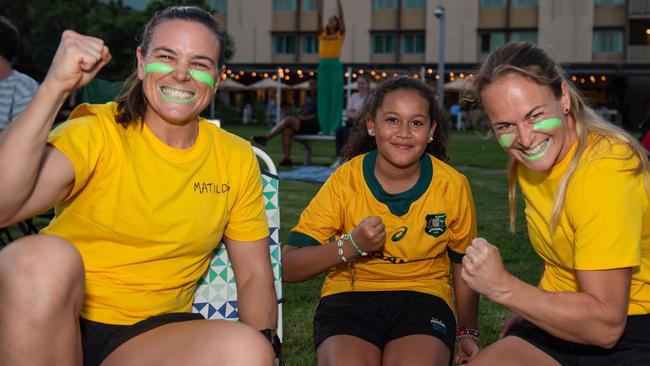 Ally Muller, Leilani Tavu and Lauren Carr as thousands of fans gather to watch the Matildas take on England in the World Cup Semifinal at Darwin Waterfront. Picture: Pema Tamang Pakhrin