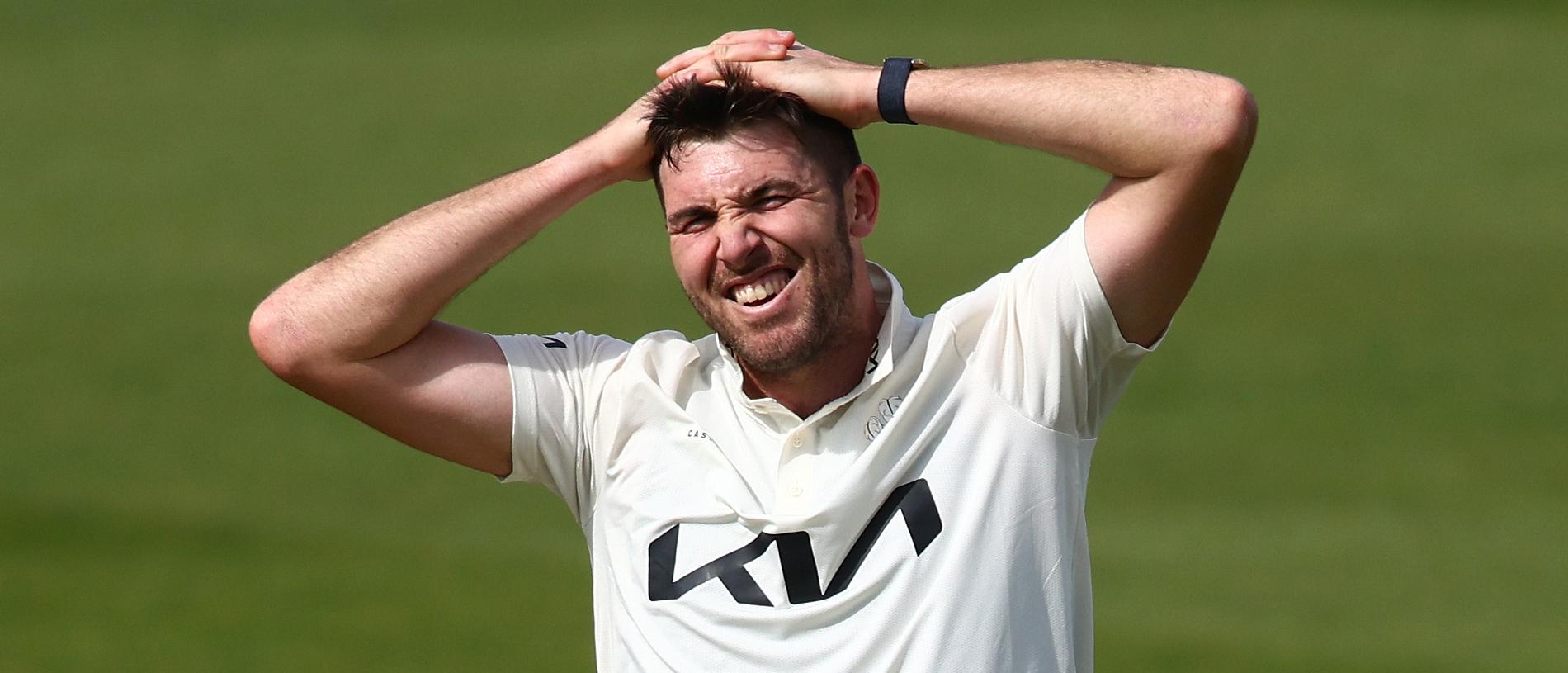 LONDON, ENGLAND - APRIL 12: Jamie Overton of Surrey reacts during the Vitality County Championship match between Surrey and Somerset at the Kia Oval on April 12, 2024 in London, England. (Photo by Ben Hoskins/Getty Images for Surrey CCC)