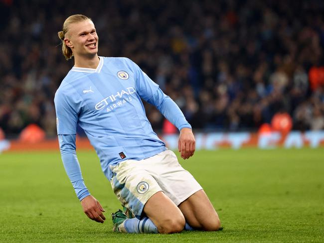 Erling Haaland has signed a 10-year contract that will keep him at Man City until 2034 (Photo by Darren Staples / AFP)