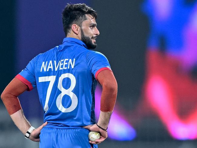 Afghanistan's Naveen-ul-Haq gestures during the 2023 ICC Men's Cricket World Cup one-day international (ODI) match between New Zealand and Afghanistan at the MA Chidambaram Stadium in Chennai on October 18, 2023. (Photo by R.Satish BABU / AFP) / -- IMAGE RESTRICTED TO EDITORIAL USE - STRICTLY NO COMMERCIAL USE --