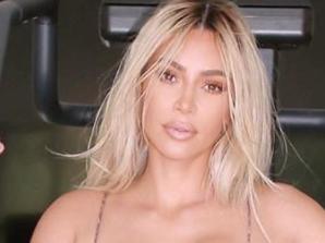 Kim Kardashian stuns in leopard print quarantine workout bikini