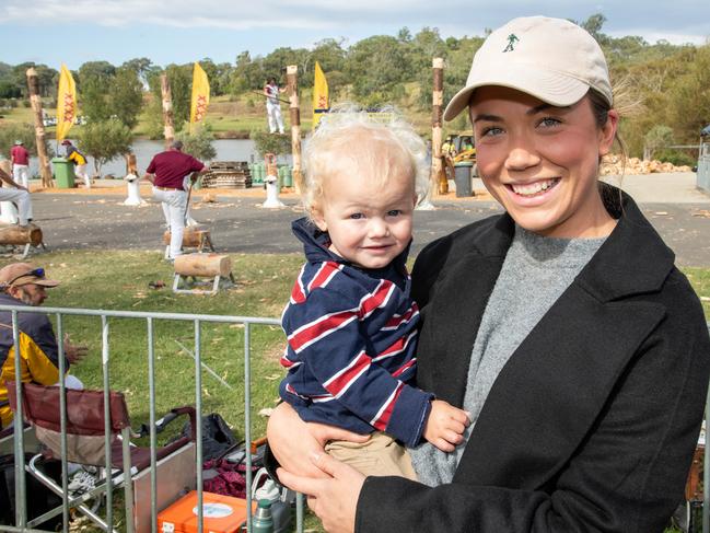 Charlie Price and Sasha Grimes ready to watch Rodney Dingle compete in the woodchop. Heritage Bank Toowoomba Royal Show.Saturday April 20th, 2024 Picture: Bev Lacey