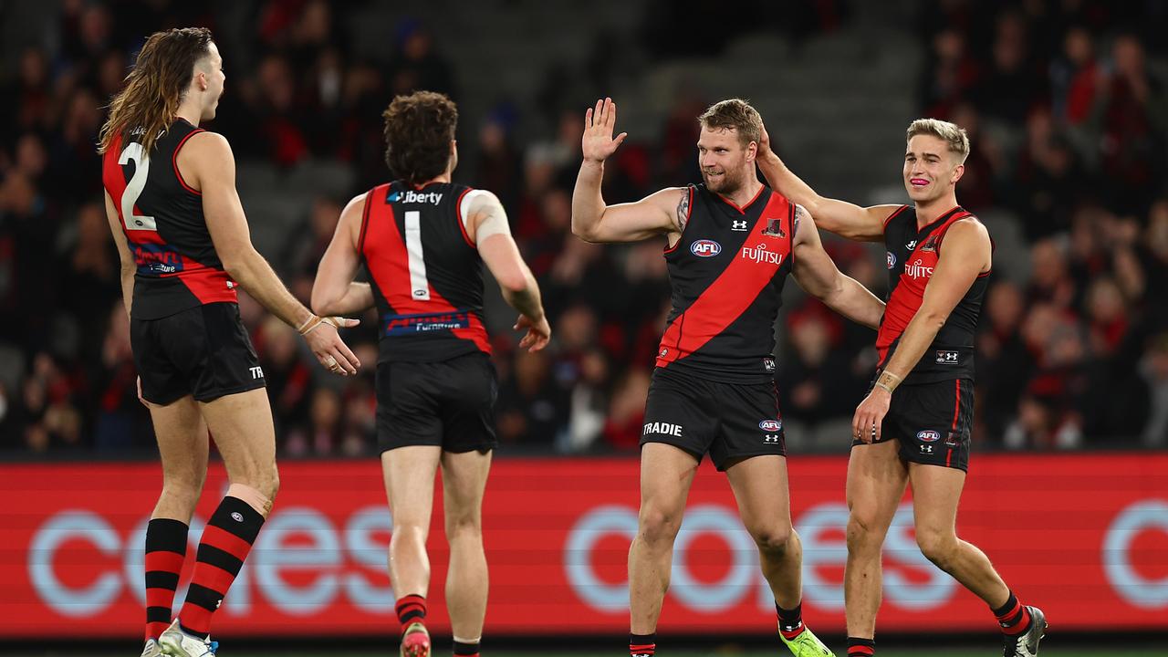 Jake Stringer of the Bombers celebrates kicking a goal. Photo by Graham Denholm/AFL Photos via Getty Images