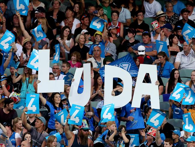 Cricket - BBL LEAGUE - Adelaide Strikers v Hurricanes at Adelaide Oval on New Year's Eve. Tim Ludeman fans celebrate another 4 runs. Photo Sarah Reed.