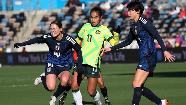 Japanâs Fuka Nagano (L) reacts as she gets tangled with Australiaâs Mary Fowler during the SheBelieves Cup football match between Japan and Australia at Shell Energy Stadium in Houston, Texas, on February 20, 2025. (Photo by Mark Felix / AFP)