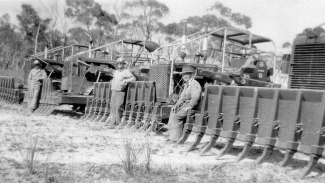 Using tractors to clear the land in the 1950s. Picture: supplied.