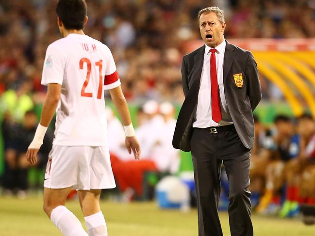 CANBERRA, AUSTRALIA - JANUARY 18: Chinese coach Alain Perrin talks to his players during the 2015 Asian Cup match between China PR and DPR Korea at Canberra Stadium on January 18, 2015 in Canberra, Australia. (Photo by Mark Nolan/Getty Images)