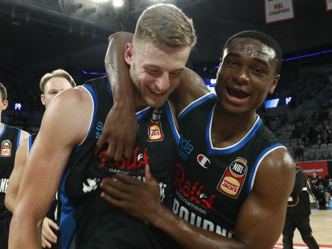 Jack White and Caleb Agada celebrate one of the 16 Melbourne United victories from the 17 games White has played in. Picture: Getty Images