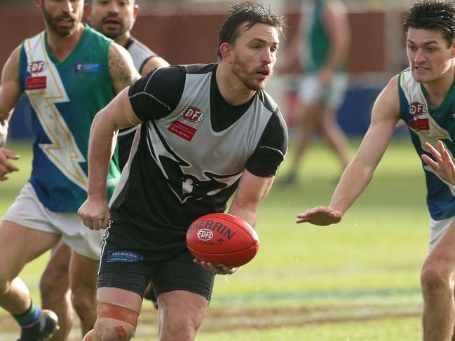 Michael Farrelly looks for an option for Roxburgh Park in last year’s grand final. Picture: Hamish Blair