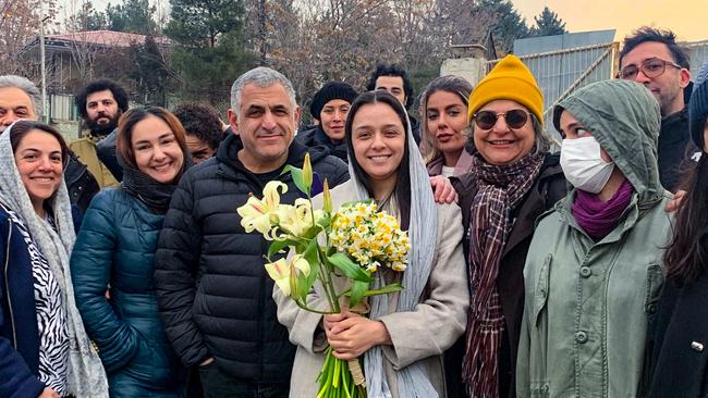 Taraneh Alidoosti is welcomed by friends after her release from Tehran’s Evin prison on Wednesday. Picture: AFP