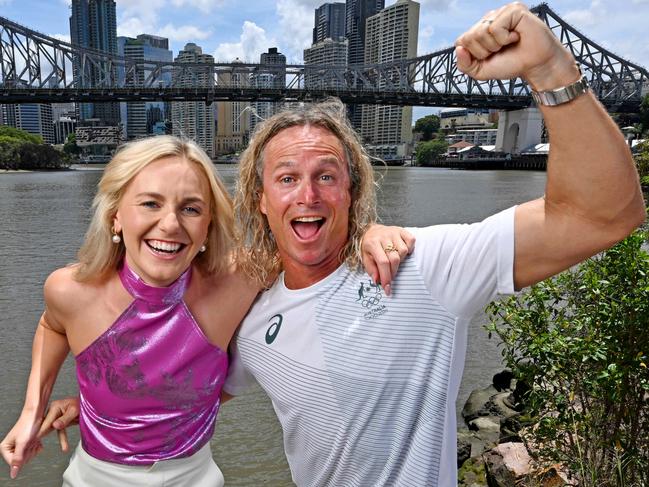 24/11/2023: Olympic swimmer  Ariarne Titmus and coach Dean Boxall on the edge of the Brisbane river before they speak at the Future Brisbane Summit at Howard Smith Wharves, Brisbane   pic: Lyndon Mechielsen/Courier Mail