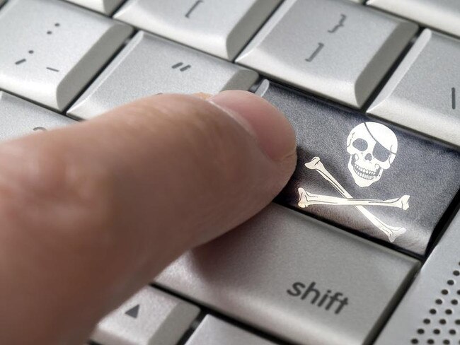 Business concept male finger pressing Pirate enter key