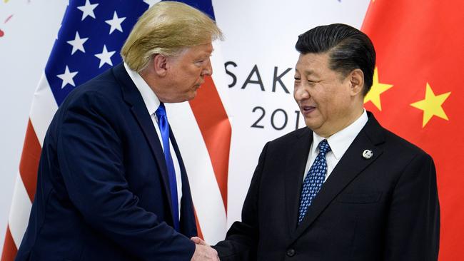 Donald Trump, left, and Xi Jinping at the G20 Summit in Osaka in June. Picture: AFP