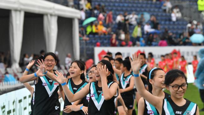 Local AFL players are seen during the Round 9 AFL match between the Gold Coast Suns and the Port Adelaide Power at the Adelaide Arena at Jiangwan Stadium in Shanghai, China, Saturday, May 19, 2018. (AAP Image/David Mariuz) NO ARCHIVING, EDITORIAL USE ONLY