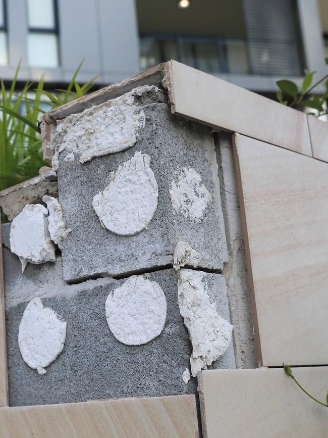 Thing sandstone tiles falling off the walls.