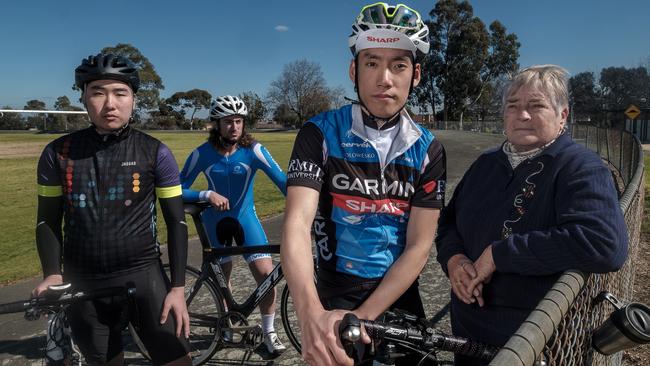 Kim Nguyen (centre) with Maurice Kirby's daughter Gayle George and, from left, Alan Giang and David Koroknai are among the growing movement to save the Maurice Kirby Velodrome. Picture: Luis Enrique Ascui