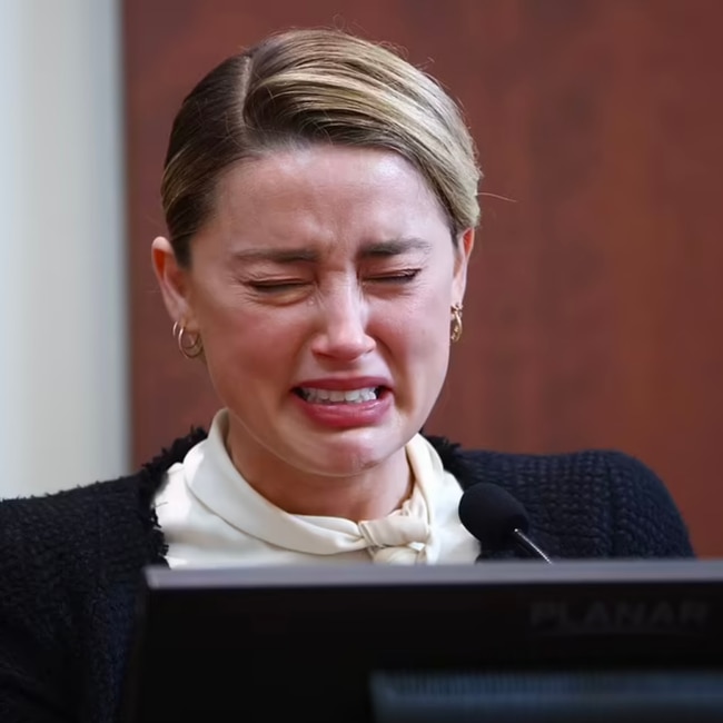 Amber Heard breaks down on the stand on Thursday.