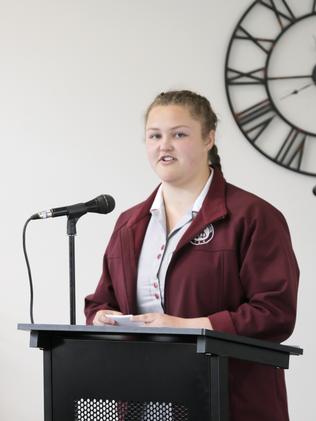 Student Remy Bailey speaks to delegates at the youth forum on family ­violence. Picture: MATT THOMPSON