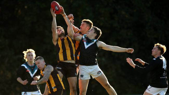 NFL: Ayman O'Dowd takes a strong mark for Heidelberg West. Picture: Hamish Blair