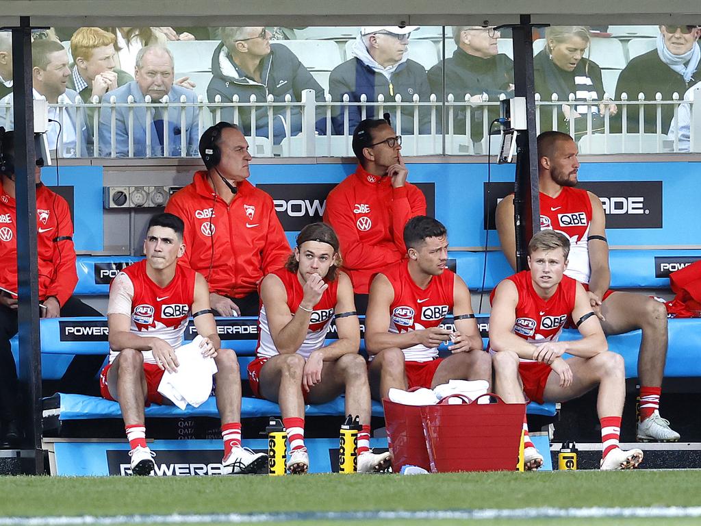 Sam Reid (back right) ended the 2022 AFL grand final being subbed out of the game.