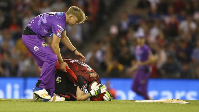 Nathan Ellis tends to Sam Harper after the incident.