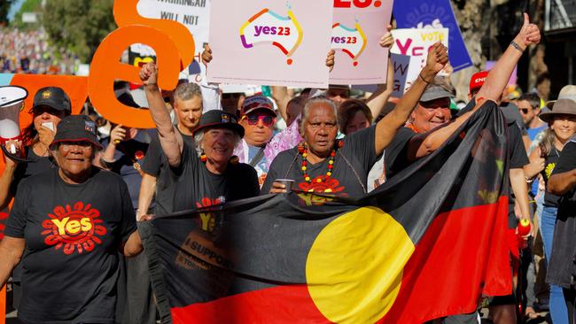 People take part in a "Walk for Yes" rally for the upcoming voice referendum in Sydney.