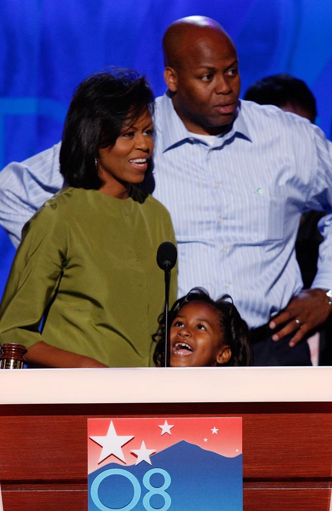 Michelle Obama with her brother Craig Robinson and daughter Sasha at the Democratic National Convention in 2008. Picture: AP