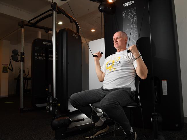 5/8/20. Former AFL player Mark Mickan, 59, Fulham who was diagnosed with Parkinson's disease in August 2016. He doing rehab work in the gym, Brain Body Fitness Studio, for a research story about the possible connection between brain injury and the disease (although that's not why he thinks he's got it) Picture: Keryn Stevens