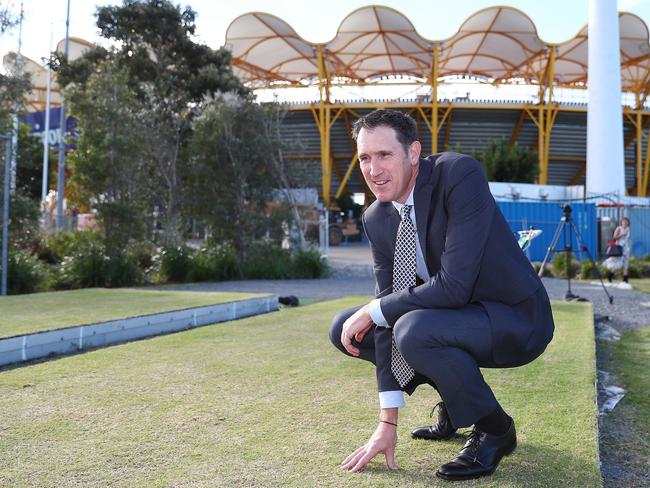 CEO of Cricket Australia James Sutherland inspects the drop in pitch outside Metricon while announcing the 2018/19 international cricket schedule at Metricon Stadium (Photo by Chris Hyde/Getty Images)