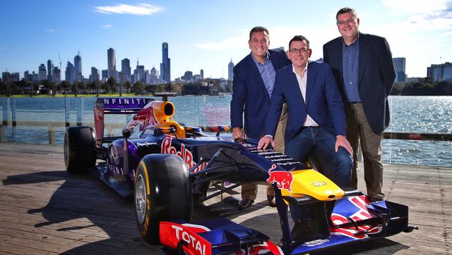 Dan Andrews announces an extension of Melbourne’s F1 Grand Prix contract with former Sports Minister John Eren and GP chairman John Harnden. Picture: Hamish Blair