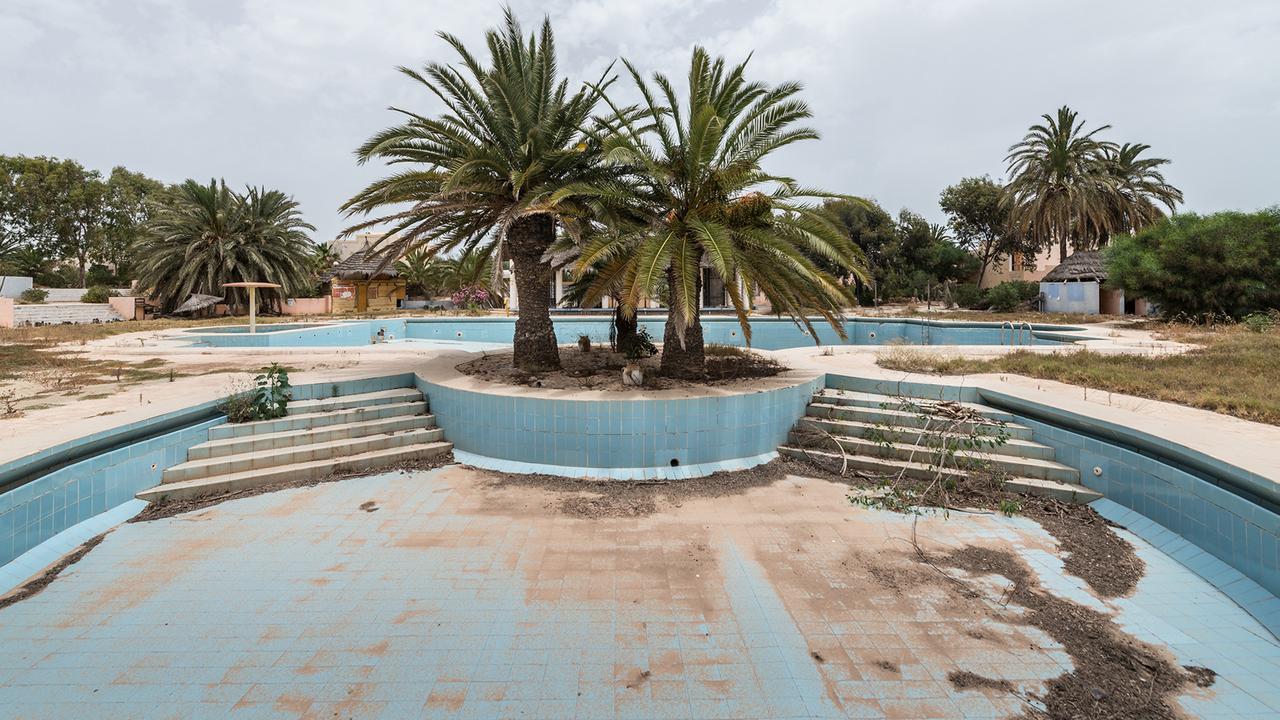 This swimming pool used to be packed with tourists during the summer. Picture: Bob Thissen/Caters News Agency