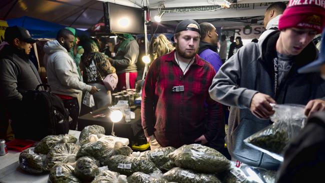 In this Saturday, Dec. 29, 2018 photo large quantities of cannabis is offered during a farmers market style marijuana event Kushstock 6.5 in Adelanto Calif. (AP Photo/Richard Vogel)