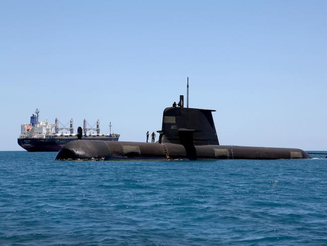 Collins Class Submarine, HMAS Sheean, in Cockburn Sound, Western Australia. *** Local Caption *** Officers and sailors at work on Collins Class Submarine, HMAS Sheean, whilst transiting Cockburn Sound in Western Australia.   HMAS Sheean is the fifth Collins Class Submarine built by ship building company, ASC Pty Ltd, in Adelaide, Australia.