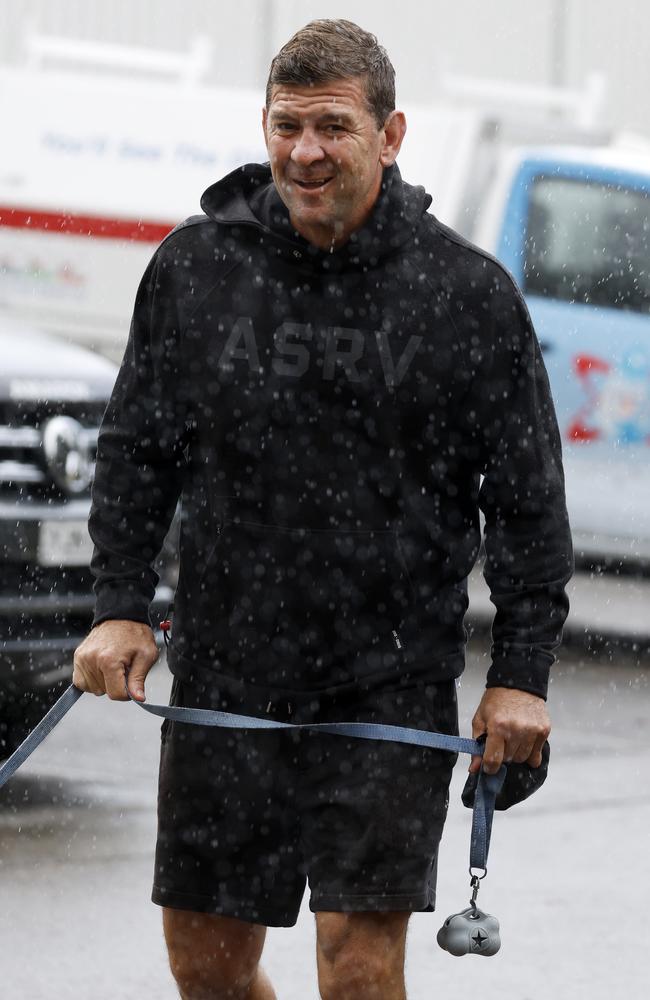 Jason Demetriou taking his dog for a walk in Caringbah South the day after being sacked as South Sydney coach. Picture: Jonathan Ng