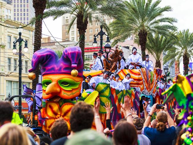 Mardi Gras parades through the streets of New Orleans.