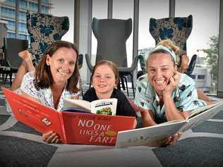 LOVE OF BOOKS: Pyjama angels Nikkii Joyce and Kathryn Stevens with her son Henry are ready for the upcoming Pyjama Foundation's Battle of the Brains Trivia Night. Picture: Patrick Woods