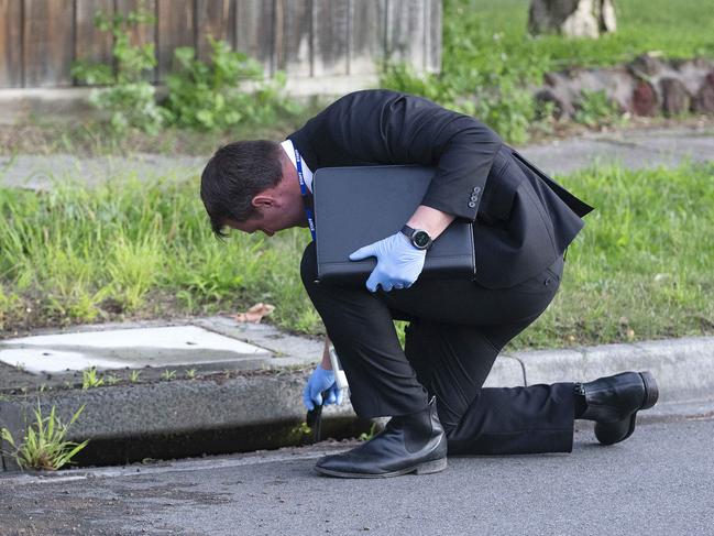 Police searching the scene at Calrossie Close in Endeavour Hills where a man was allegedly murdered. Picture: Sarah Matray