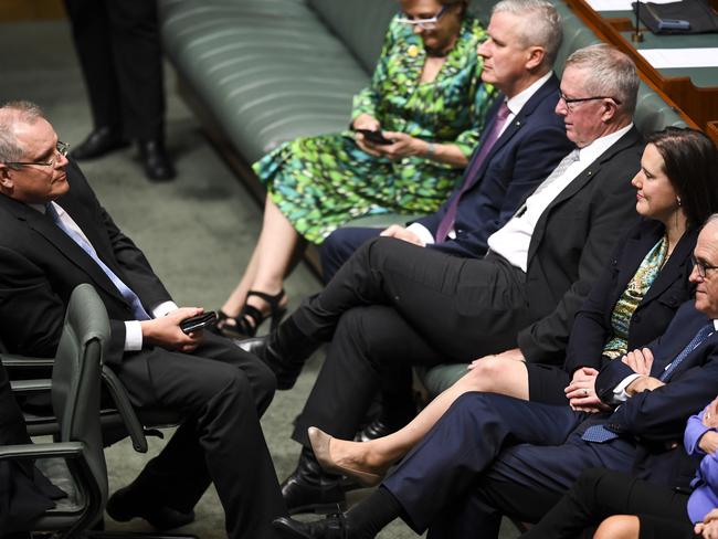 Mr Morrison and Mr Turnbull during a vote to refer Peter Dutton to the High Court in the House of Representatives. Picture: Lukas Coch/AAP