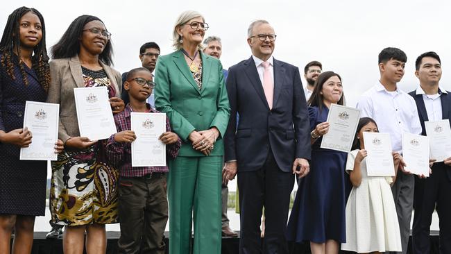 Prime Minister Anthony Albanese and Governor-General Sam Mostyn with recipients of Australian citizenship at the national citizenship and flag raising ceremony in Canberra. Picture: NewsWire/Martin Ollman