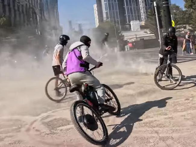 Riders perform burnouts in the city. Picture: Social Media